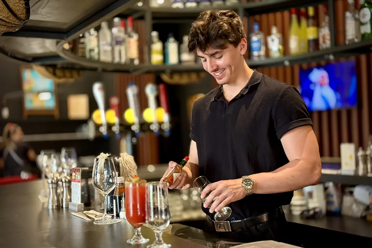 Bartender preparing a cocktail at PACINI Restaurant